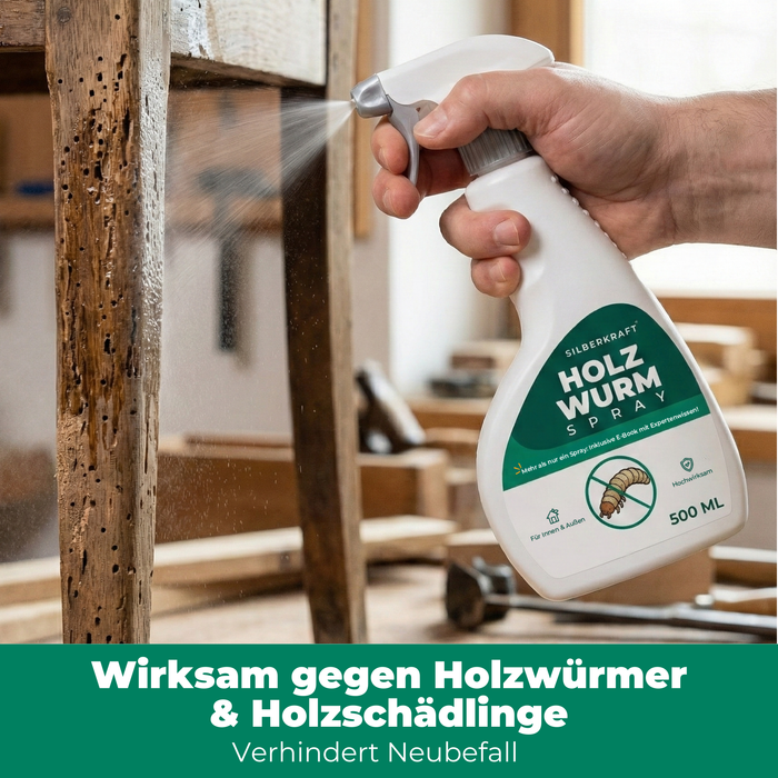 Silberkraft Holzwurmspray 500 ml in Aktion: Hand sprüht auf befallenes Holz – wirksam gegen Holzwürmer und alle Holzschädlinge, verhindert Neubefall.